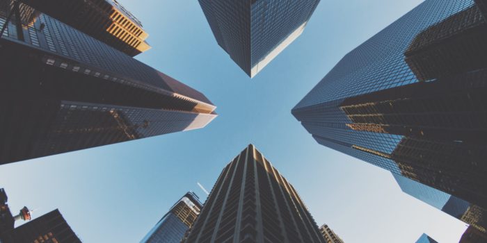 A worm's eye view of 4 skyscrapers in Calgary, Canada.