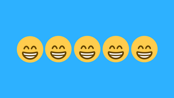 A row of grinning emojis with smiling eyes on a bright blue background