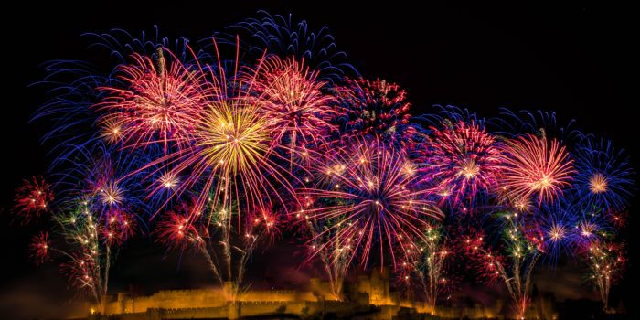 Fireworks display at night.