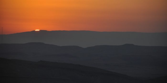 Silhouette of a mountain at sunset